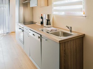 Cottage | Privékeuken | Een kinderstoel