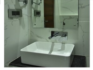 Shower, hydromassage showerhead, designer toiletries, hair dryer