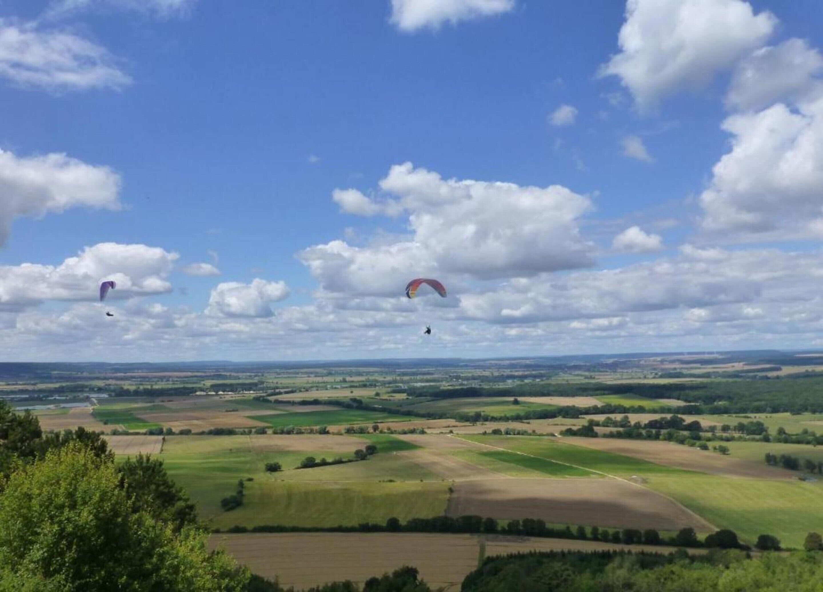 A landscape with fields and a clear sky.