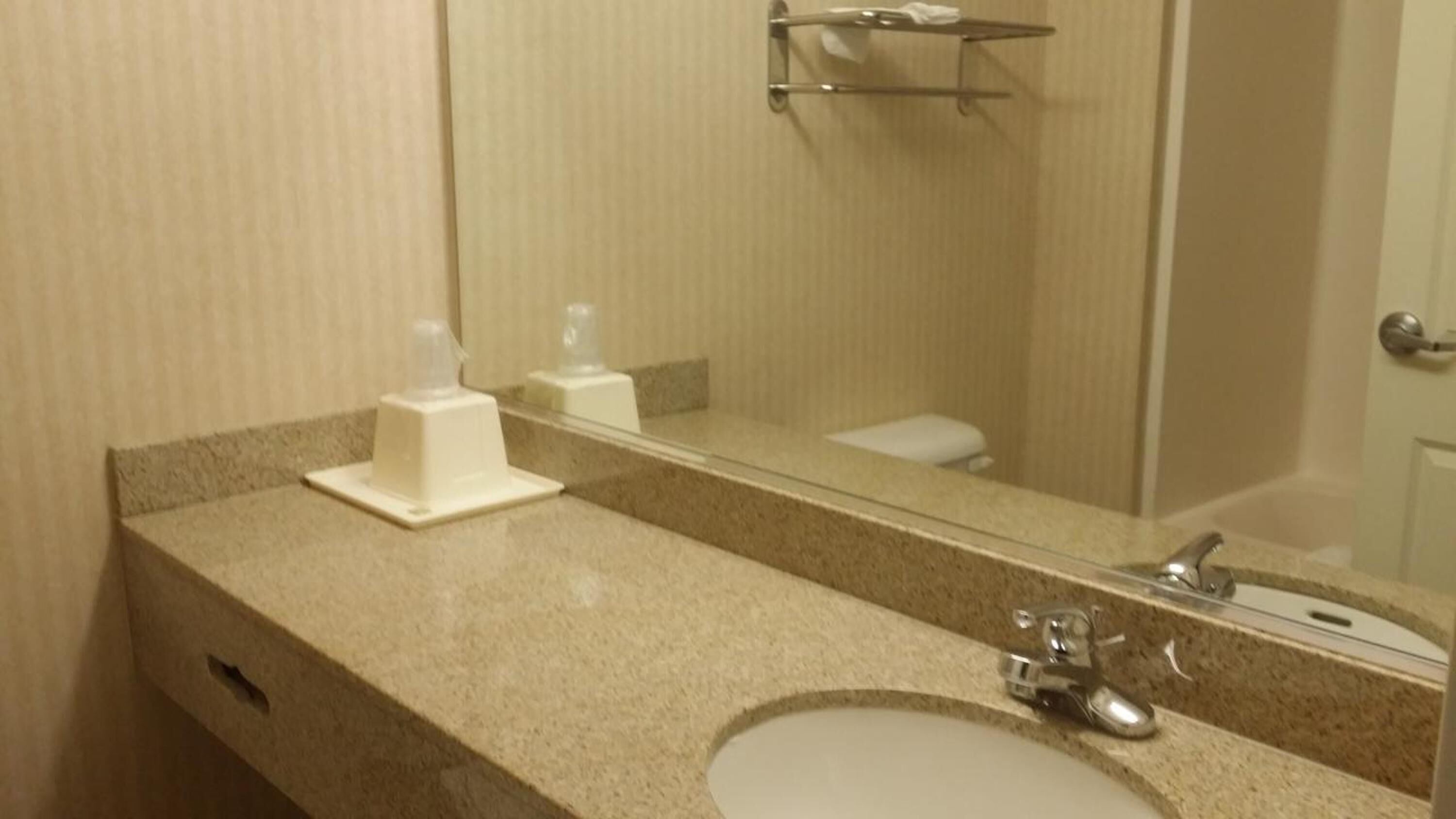 bathtub, free toiletries, towels, soap