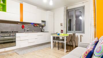 Apartment, 2 Bedrooms | Living area | Flat-screen TV