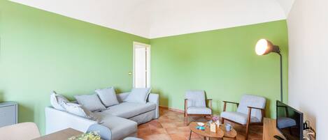 Apartment, 1 Bedroom | Living area | Flat-screen TV