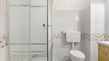 Apartment, 2 Bedrooms | Bathroom | Shower, rainfall showerhead, hair dryer, bidet