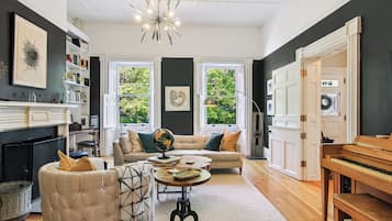 TV, fireplace, books