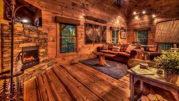 Cabin, 2 Bedrooms | Living area | 36-inch TV with cable channels