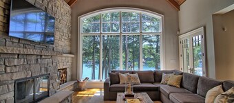 Stunning Cottage on Lake Joe! 6 bdrm,6 bath,2 slip boathouse! Water Toys Galore!