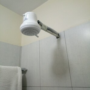 Single Room | Bathroom | Shower, rainfall showerhead, slippers, towels