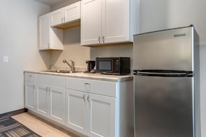 Suite, 1 King Bed, Accessible, Non Smoking | 1 bedroom, desk, blackout drapes, iron/ironing board