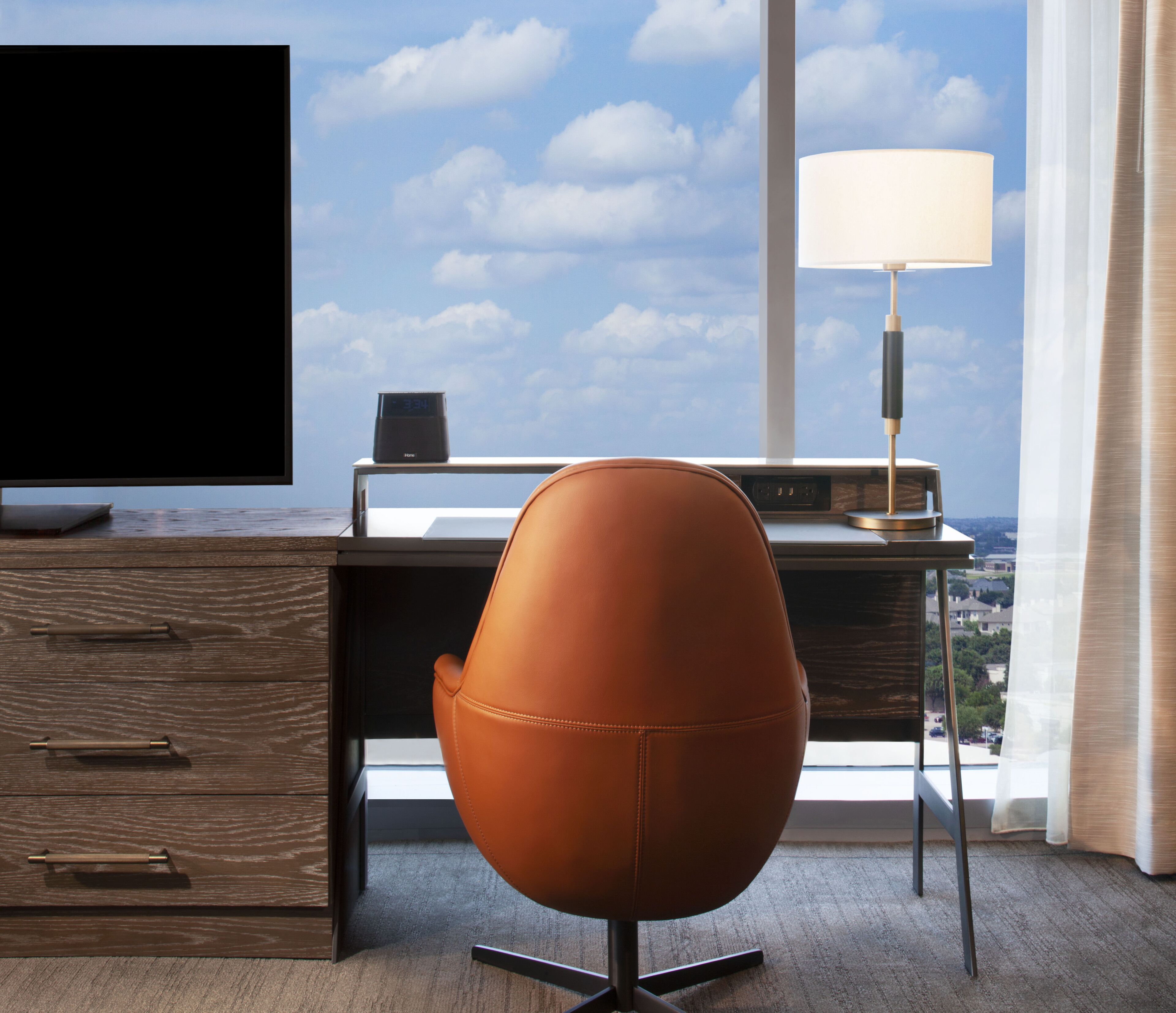 deluxe room, 1 king bed, corner | living area | 65-inch flat-screen tv with cable channels, tv