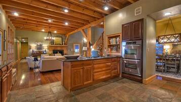 Cabin, 6 Bedrooms | Private kitchen | Fridge, microwave, stovetop, dishwasher
