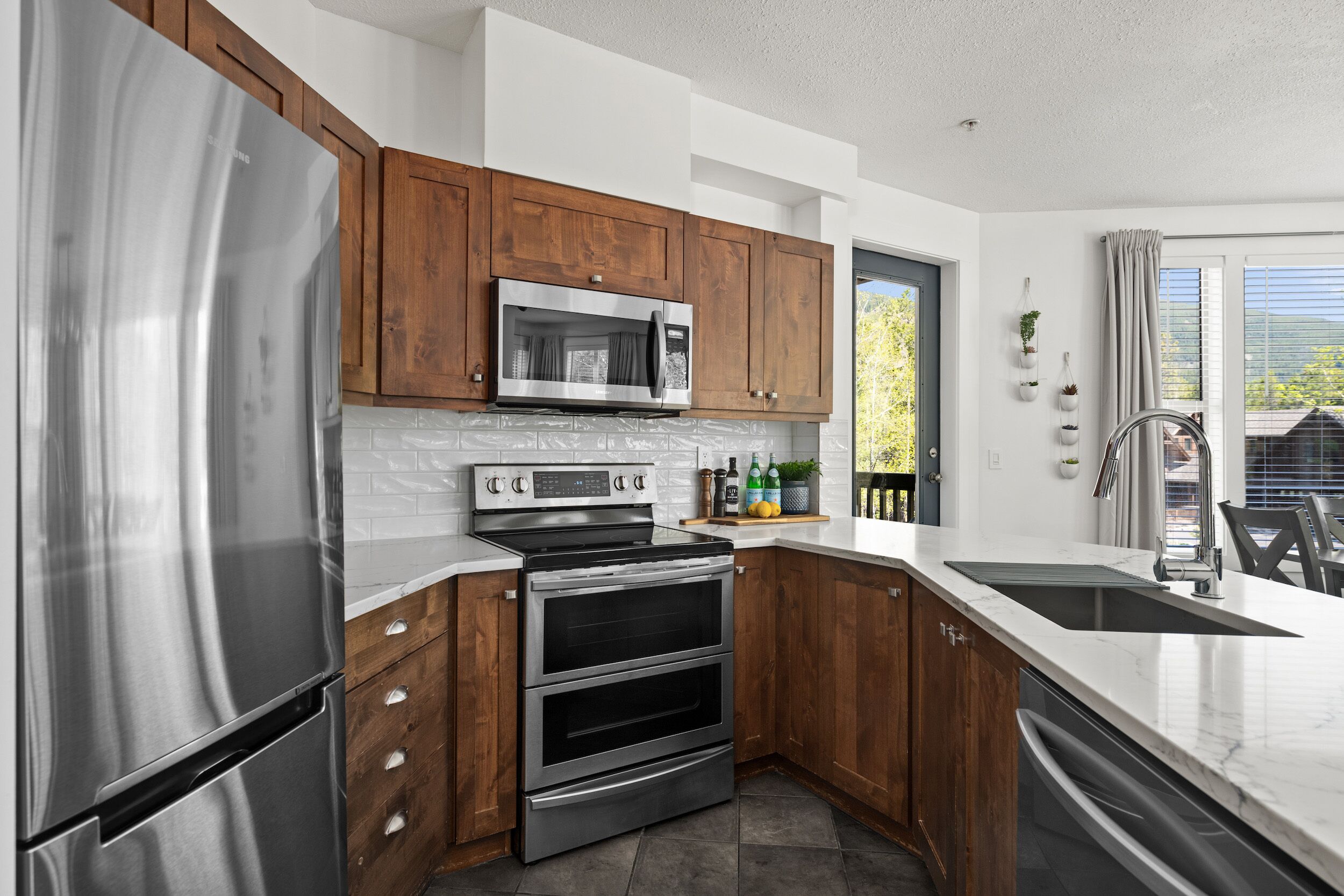 MVP Rentals Inc. Prime Location Upper Village 2 Bedroom Condo.