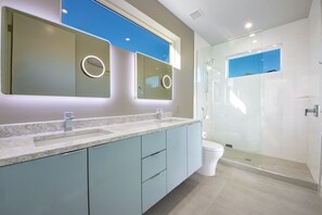 Bathtub, hair dryer, towels, soap