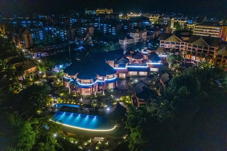 Front of property - evening/night. Ximeng Xikang Wellness & Resorts