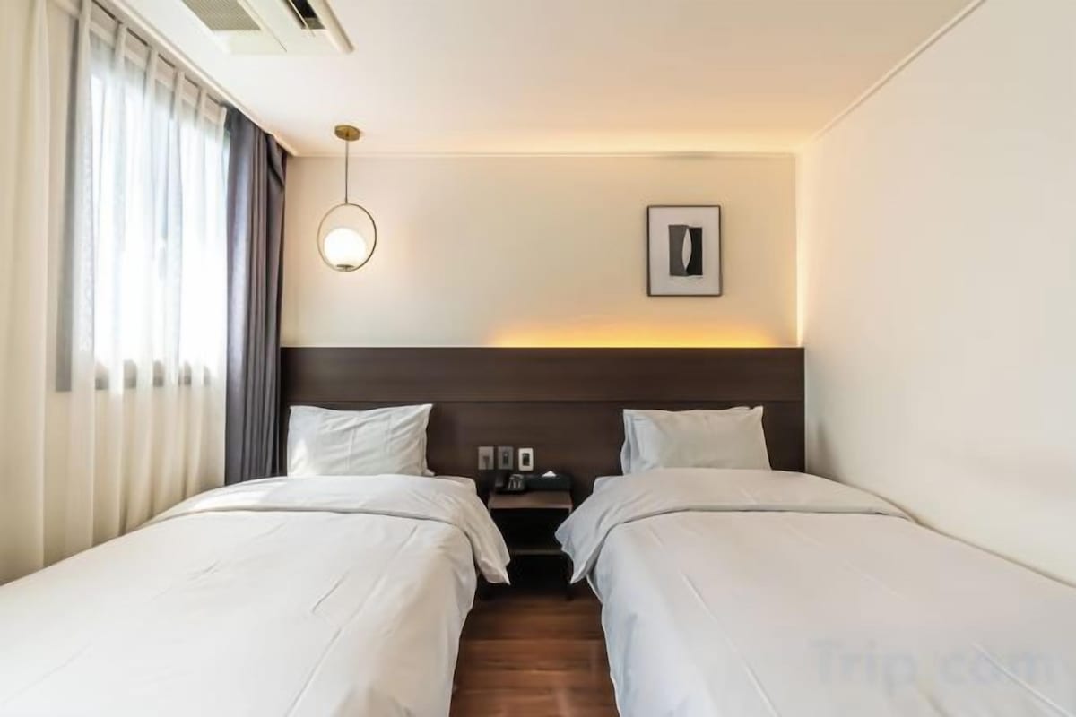 Premium bedding, down duvets, memory-foam beds, in-room safe