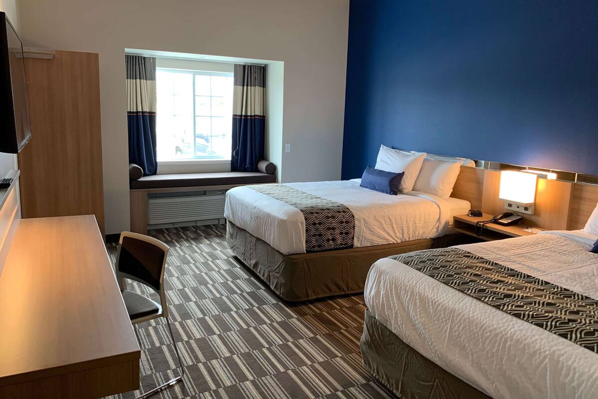 Room, 2 Queen Beds, Non Smoking | Desk, iron/ironing board, WiFi (free), bed sheets