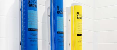 Three shampoo bottles labeled 'NOT SOAP RADIO' in different colors.