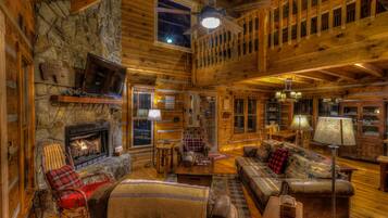 Cabin, 4 Bedrooms | Living room | 34-inch TV with cable channels
