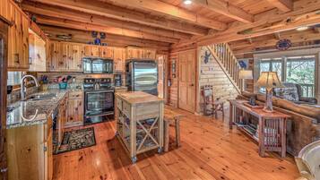 Cabin, 4 Bedrooms | Private kitchen | Fridge, microwave, stovetop, dishwasher