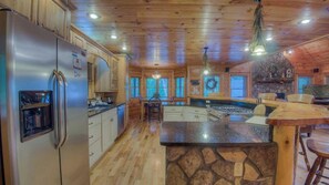 Cabin, 5 Bedrooms | Private kitchen | Fridge, microwave, stovetop, dishwasher