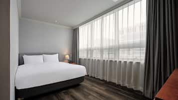 Premium bedding, in-room safe, desk, blackout drapes