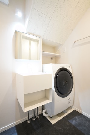 Habitación con 2 camas individuales | Lavandería