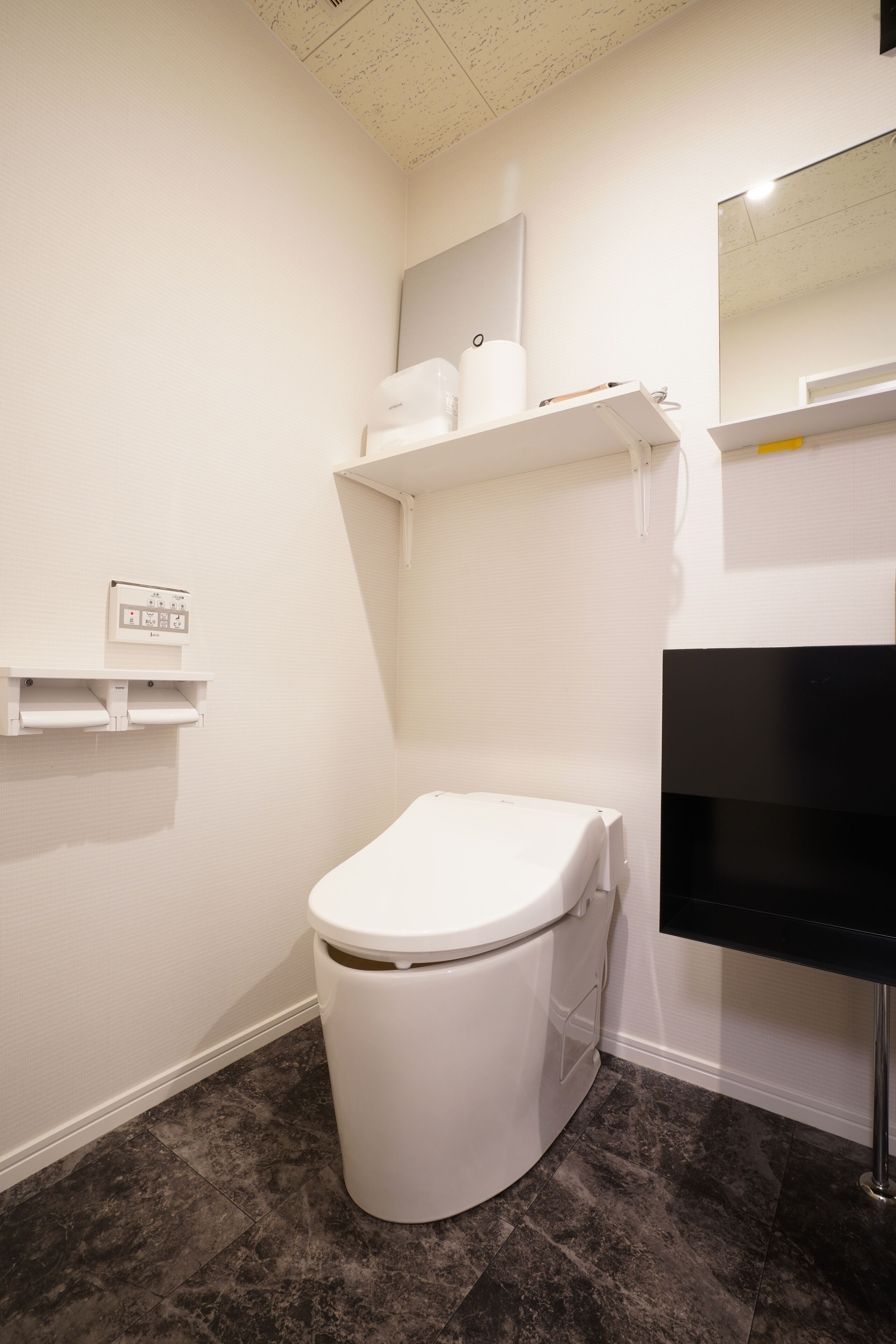 hair dryer, bathrobes, slippers, bidet