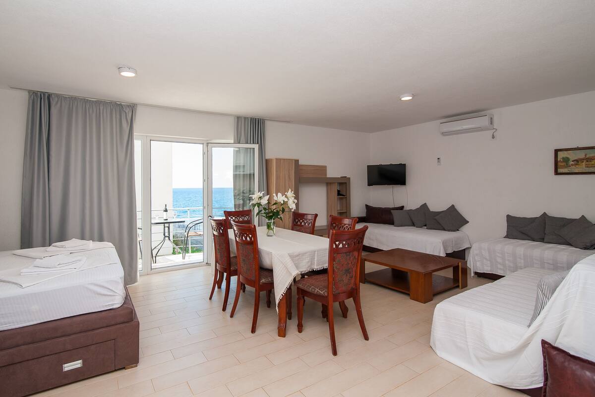 Comfort Apartment, 1 Bedroom, Balcony, Partial Sea View | Living area | 32-inch flat-screen TV with satellite channels, LCD TV