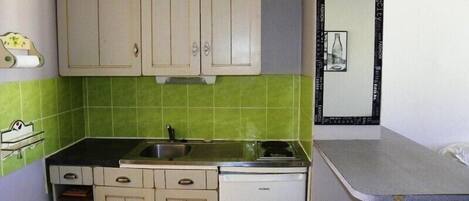 Fridge, microwave, cookware/dishes/utensils