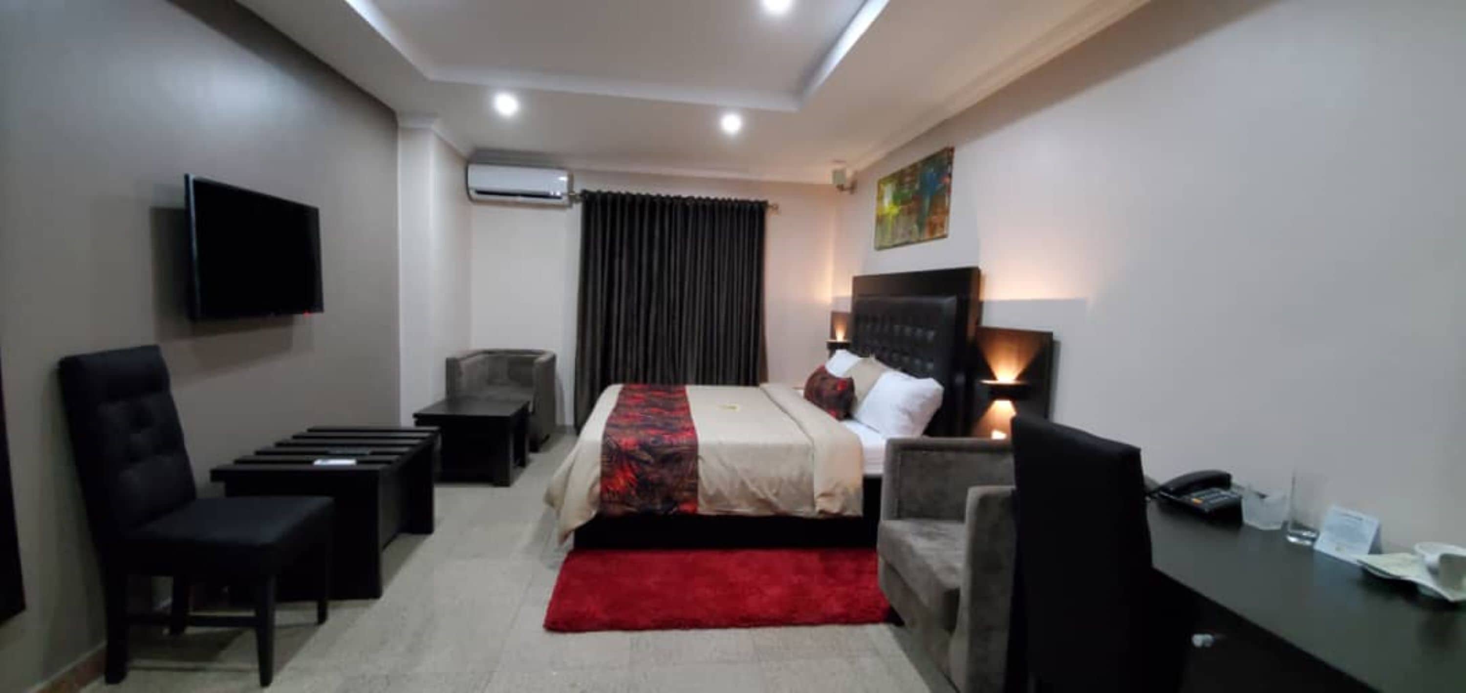 Habitación Deluxe | Caja de seguridad en la habitación, wifi gratis y ropa de cama 