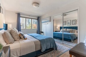 1 bedroom, desk, iron/ironing board, travel crib