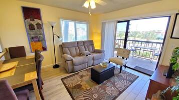 Condo, Multiple Beds, Balcony | Living room | 42-inch TV with cable channels