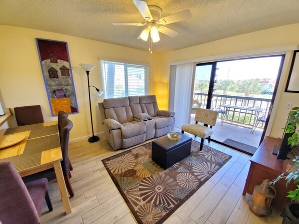 Condo, Multiple Beds, Balcony | Living room | 42-inch TV with cable channels