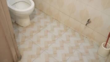 Shower, rainfall showerhead, towels, soap