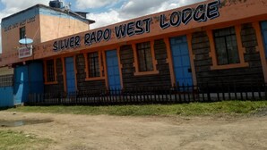 A building with signage reading "Silver Rapo West Lodge". - Silver Rado West Lodge (Nakuru)