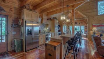 Cabin, 4 Bedrooms | Private kitchen | Fridge, microwave, stovetop, dishwasher
