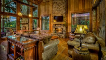 Cabin, 3 Bedrooms | Living area | 32-inch TV with digital channels