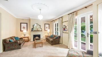 TV, fireplace, books, offices