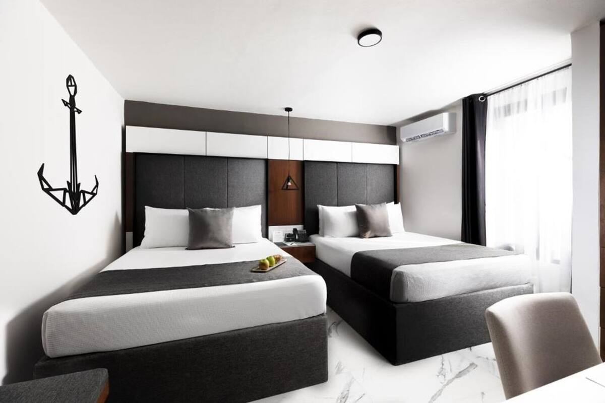 Premium bedding, down comforters, memory foam beds, in-room safe