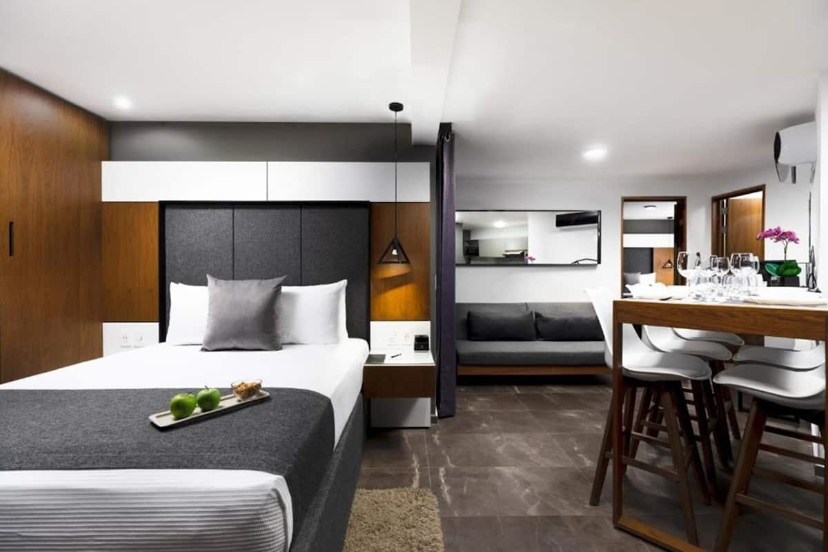 Premium bedding, down comforters, memory foam beds, in-room safe