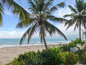 On the beach, sun-loungers, beach towels