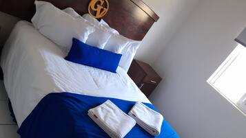 Premium bedding, down comforters, in-room safe, blackout drapes