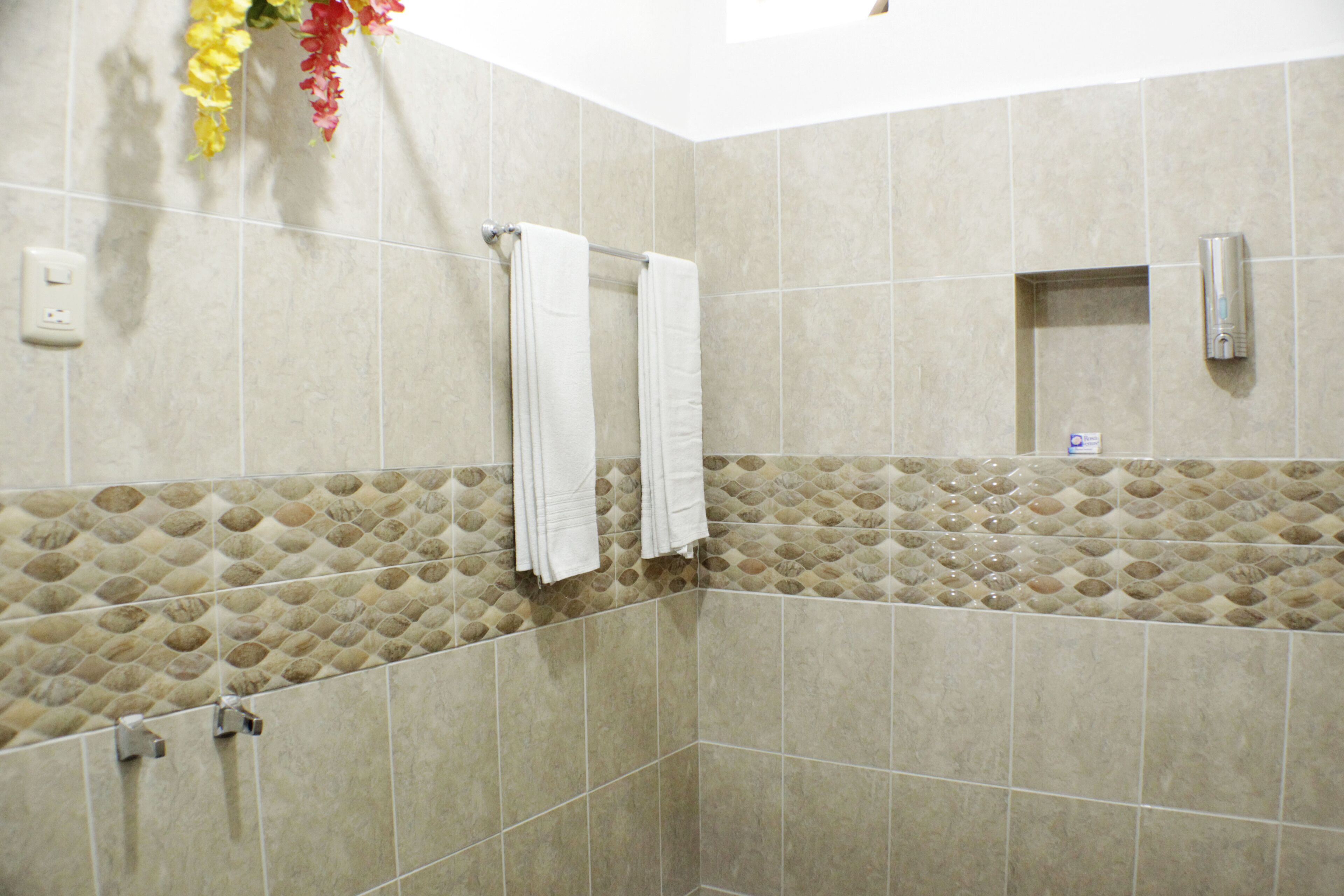 standard room, 2 double beds | bathroom | shower, towels, soap, shampoo