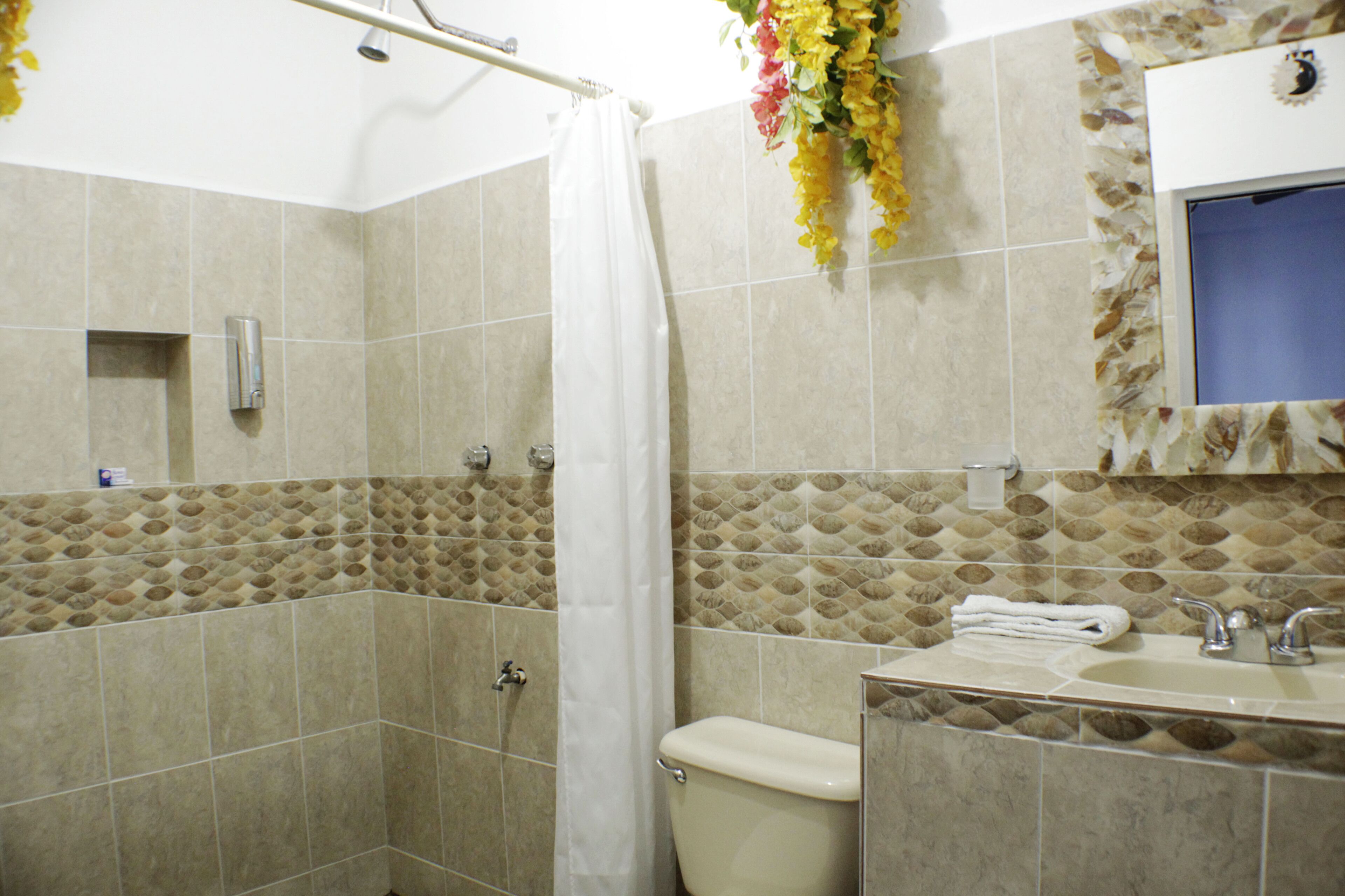 standard room, 2 double beds | bathroom | shower, towels, soap, shampoo