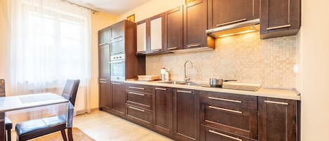 Apartment | Private kitchen | Fridge, microwave, oven, stovetop