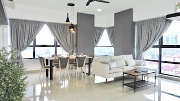 Comfort Apartment, 3 Bedrooms | Living area | Flat-screen TV