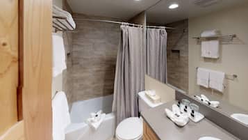 Tina con regadera y secadora de cabello