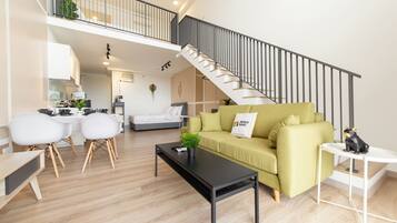 Comfort Duplex, 1 Bedroom | Living area | Flat-screen TV