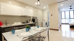 Apartment, 2 Bedrooms (C-20-3A) | Private kitchenette | Fridge, microwave, stovetop, cookware/dishes/utensils