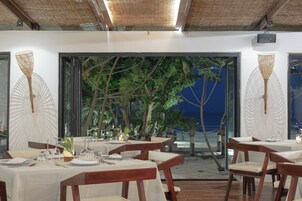 Breakfast, lunch, dinner served; local and international cuisine 