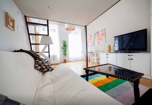 Apartment (Split Level) | Living area | Flat-screen TV - Apartment Sunny Akacfa (Budapest)